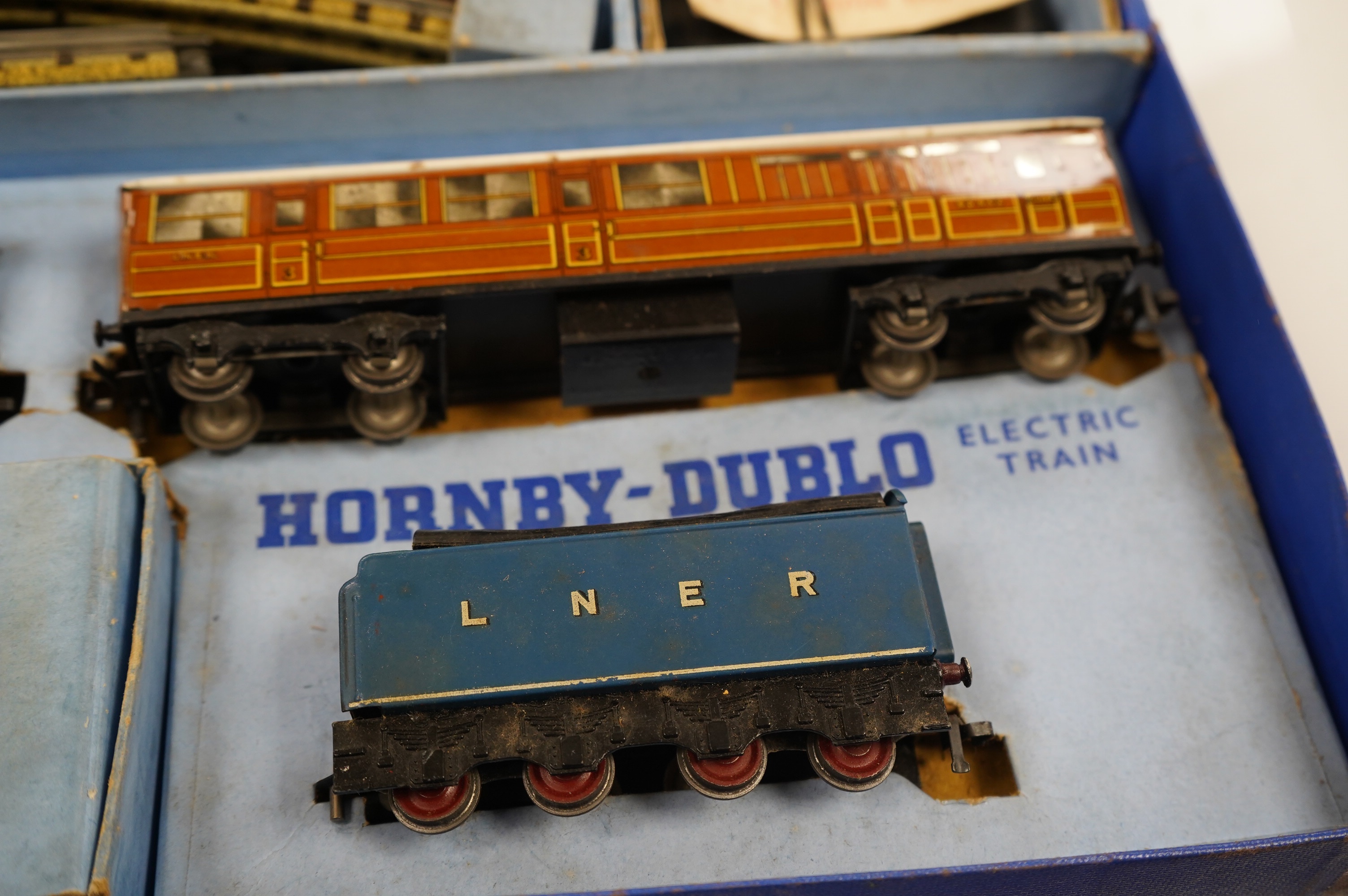 A boxed Hornby Dublo LNER Passenger Train set (EDP1) for 3-rail running, comprising of a class A4 4-6-2 locomotive, Sir Nigel Gresley, 7, two teak coaches and a quantity of track sections, etc. Condition - fair to good,